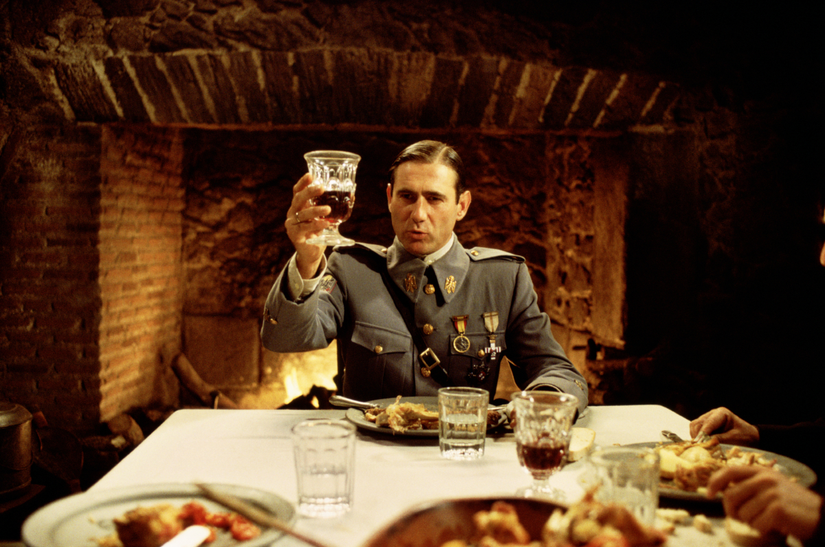 The Captain at a dinner table